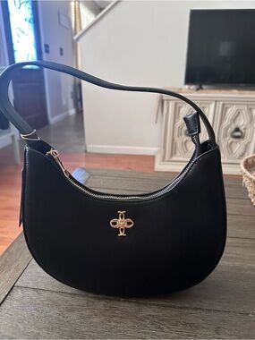 Black Crescent Shoulder Satchel with Gold Emblem